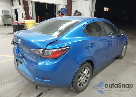 2018 Toyota Yaris Ia из США, поврежденный, VIN 3MYDLBYV7JY318324